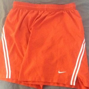 Orange Nike shorts